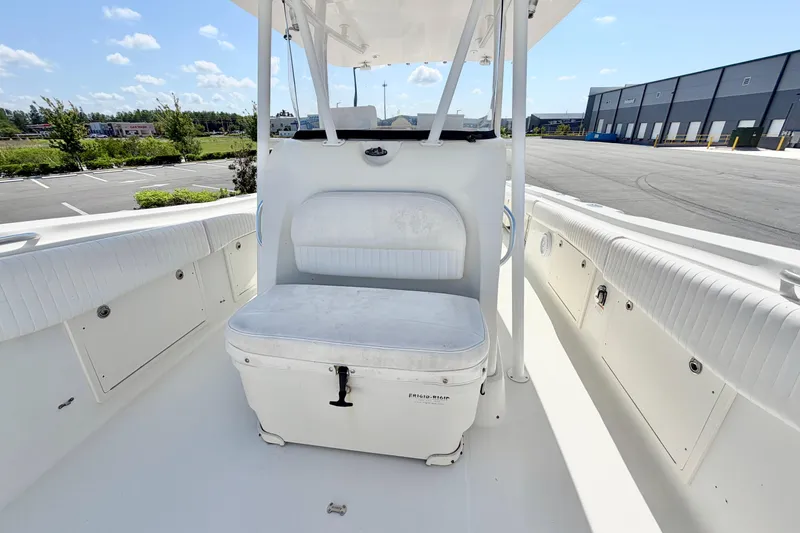 Slide: The Image of 2004 Hydra-Sports Vector 3300 CC boat interior with seating and storage compartments. - 16