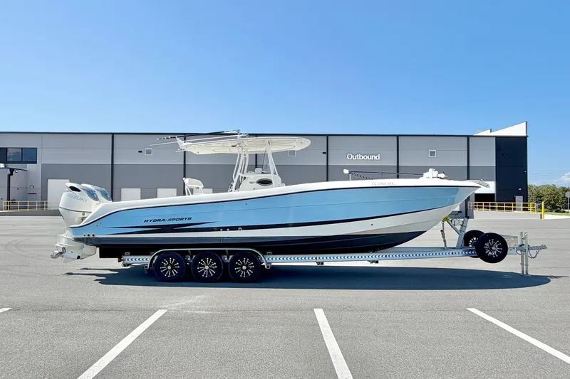 Slide: The Image of 2004 Hydra-Sports Vector 3300 CC boat on trailer in parking lot. - 5