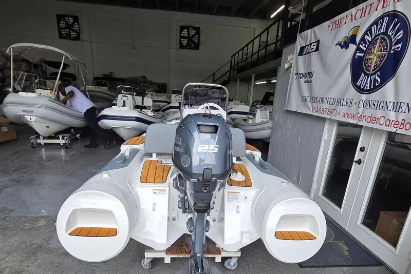 Slide: The Image of 2026 Gala Viking V330 boat with Tohatsu 30HP engine in showroom. - 7