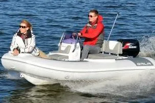 Slide: The Image of 2026 Gala Viking V330 boat with Tohatsu 30HP engine cruising on water. - 13