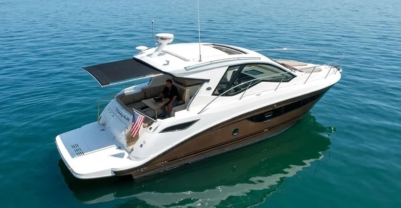 Slide: The Image of 2017 Sea Ray Sundancer 350 Coupe on calm water. - 1