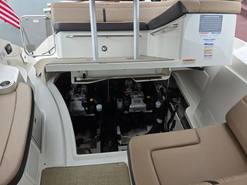 Slide: The Image of Engine compartment of a 2017 Sea Ray Sundancer 350 Coupe with open hatch. - 38