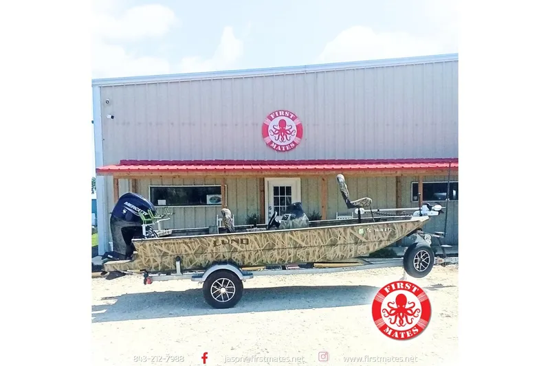 The Image of 2025 Lund 1760 Predator SC boat on trailer outside First Mates building. - 4