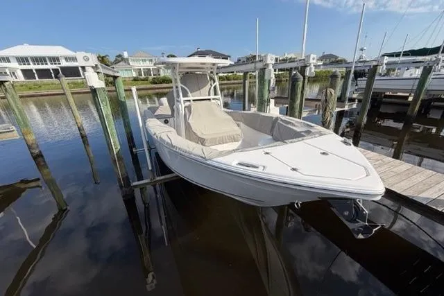 Slide: The Image of 2023 Seafox 268 boat docked at marina, featuring sleek design and modern amenities. - 17