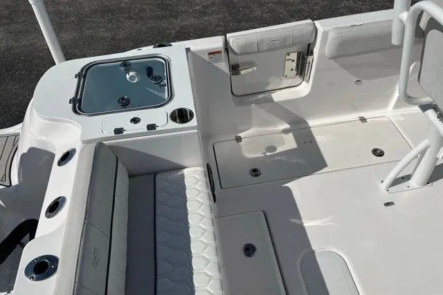 Slide: The Image of 2023 Seafox 268 boat interior with seating, storage, and fishing amenities. - 5