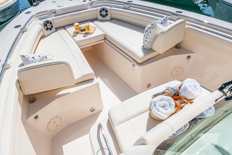Slide: The Image of Manufacturer Provided Image: 2025 Grady-White Canyon 336 boat interior with luxurious seating and refreshments. - 5
