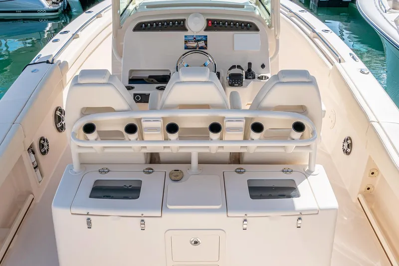 Slide: The Image of Manufacturer Provided Image: 2025 Grady-White Canyon 336 boat interior with helm and seating area. - 7