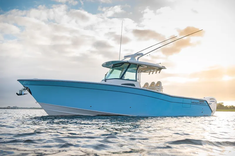 The Image of Manufacturer Provided Image: 2025 Grady-White Canyon 336 boat on water at sunset. - 1