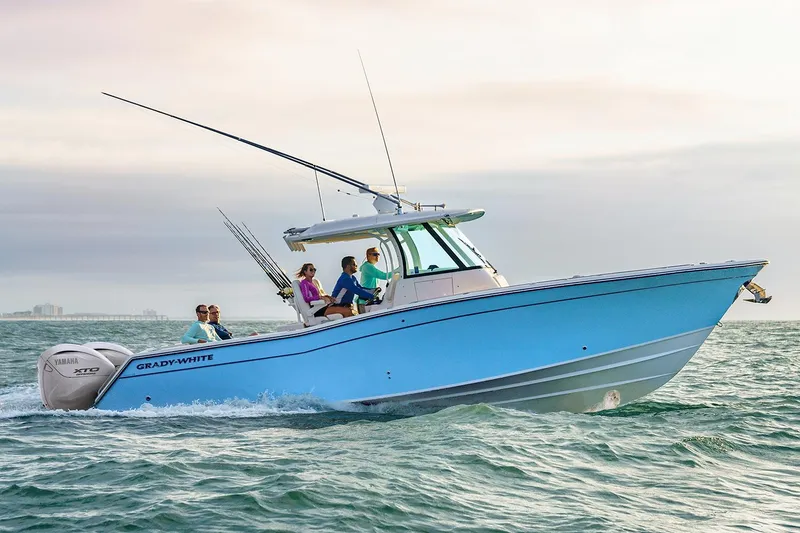 Slide: The Image of Manufacturer Provided Image: 2025 Grady-White Canyon 336 boat cruising on open water, side view. - 0