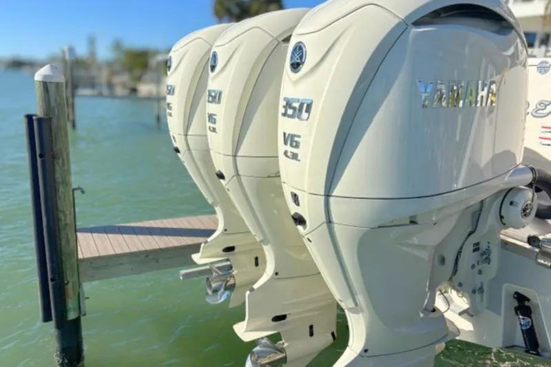 Slide: The Image of Triple Yamaha 350 V6 outboard engines on a 2025 Grady-White Canyon 336 boat. - 14
