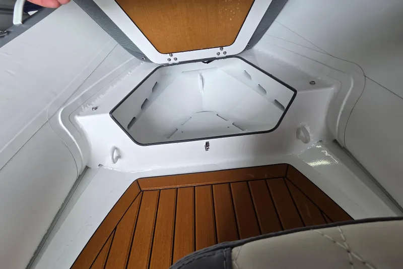 Slide: The Image of Interior view of 2026 Gala Viking V330 boat with storage compartment. - 5