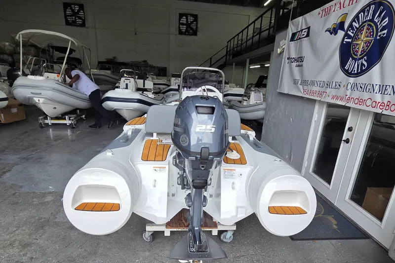 Slide: The Image of 2026 Gala Viking V330 boat with Yamaha 25HP engine in showroom. - 7