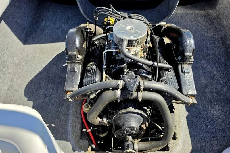 Slide: The Image of 1998 Moomba Outback boat engine, detailed view of components and layout. - 17