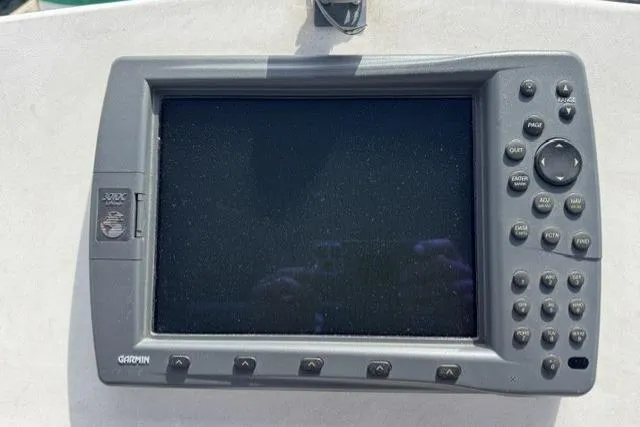 Slide: The Image of Garmin marine GPS device on 1977 Californian 38 Motor Yacht dashboard. - 48
