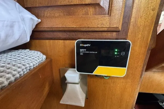 Slide: The Image of MPPT solar charge controller installed on 1977 Californian 38 Motor Yacht wooden interior. - 20