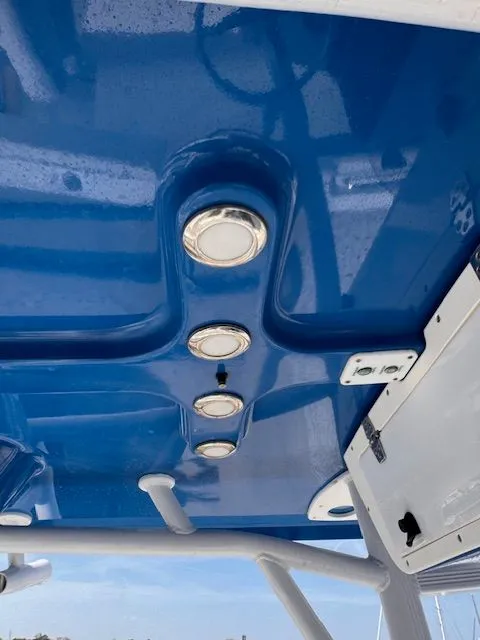 Slide: The Image of Blue boat cabin ceiling with built-in lights and white frame. - 21