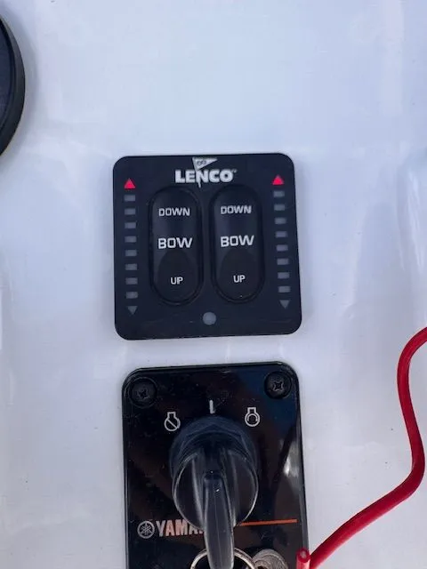 Slide: The Image of Close-up of a Sea Hunt 234 SXS boat control panel with Lenco trim tabs. - 26
