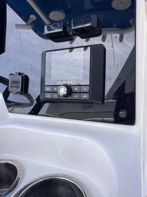 Slide: The Image of Close-up of a JL Audio control unit on a boat. - 23
