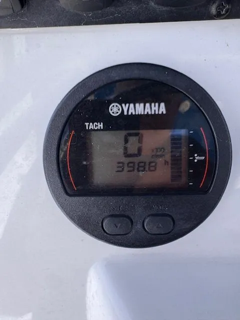 Slide: The Image of Yamaha tachometer displaying 398.8 engine hours. - 25