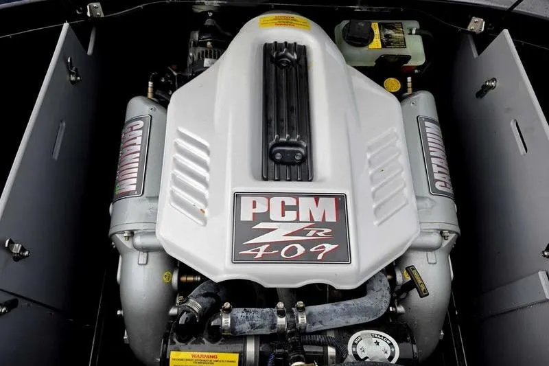 Slide: The Image of 2012 Centurion Enzo SV233 PCM ZR 409 engine, showcasing powerful marine performance. - 3
