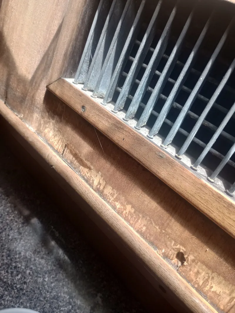 Slide: The Image of Water damage to vent located under starboard window in salon - 9