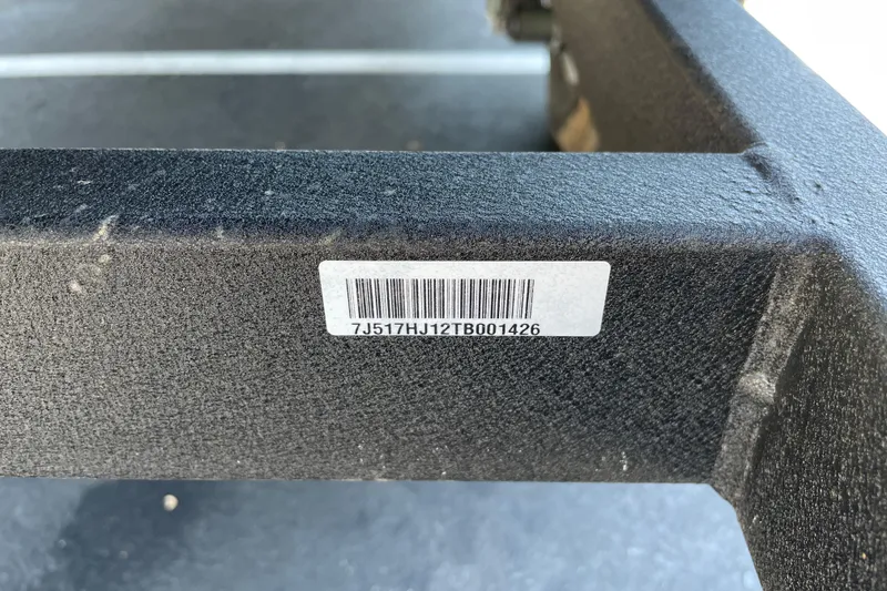 Slide: The Image of Barcode on Tracker Grizzly 1860 CC 2026 boat, displaying serial number. - 79