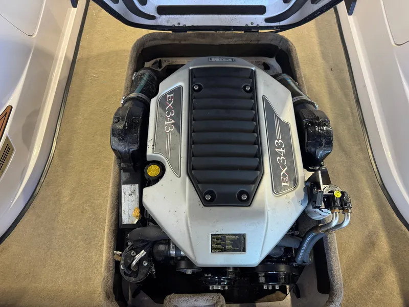 Slide: The Image of Engine compartment of a 2010 Nautique Ski Nautique 200 with an EX343 engine. - 25