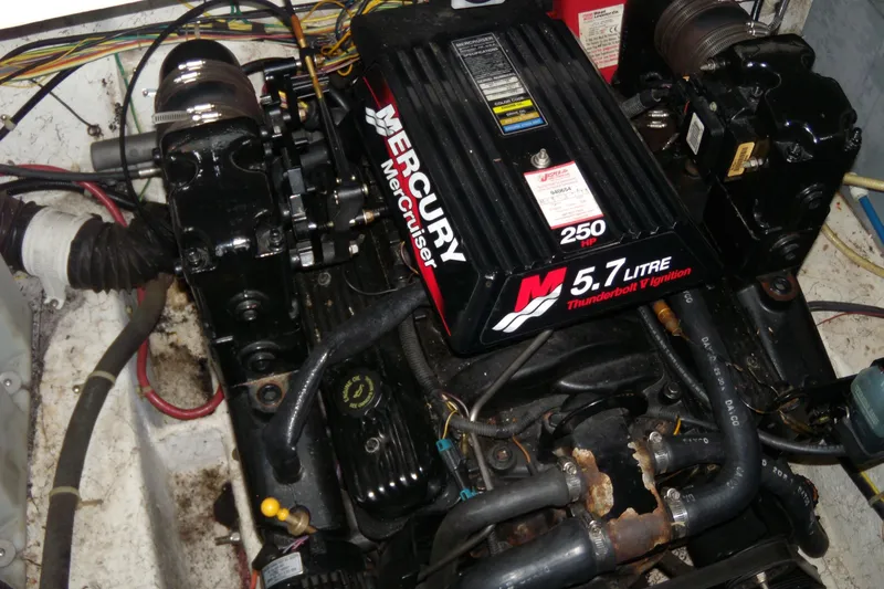 Slide: The Image of Engine compartment of a 2002 Bayliner 2455 Ciera with a Mercury MerCruiser 5.7L engine. - 8