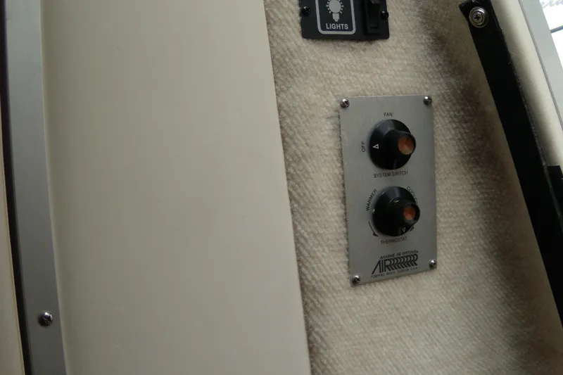 Slide: The Image of Control panel on a 2002 Bayliner 2455 Ciera boat interior. - 15