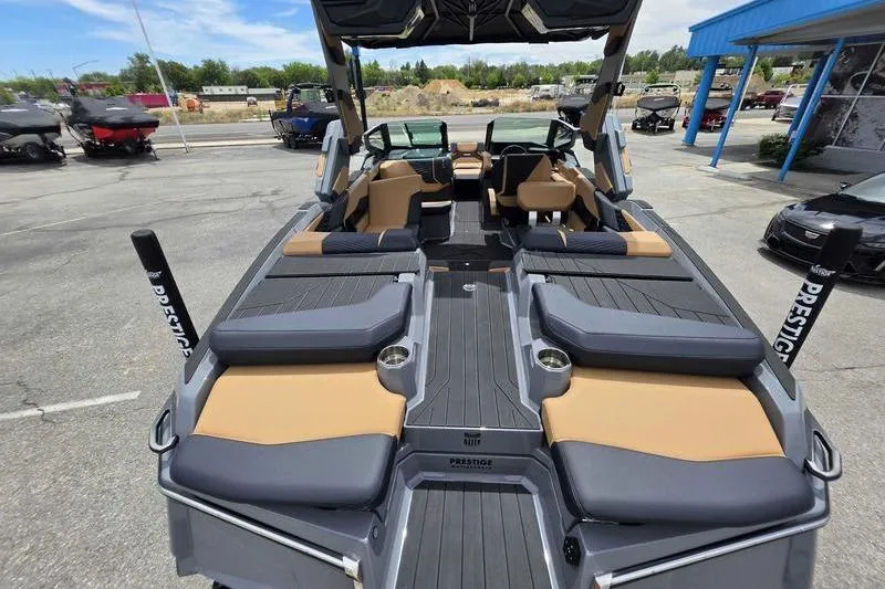 Slide: The Image of 2027 MasterCraft X23 boat interior with luxurious seating and modern design. - 15