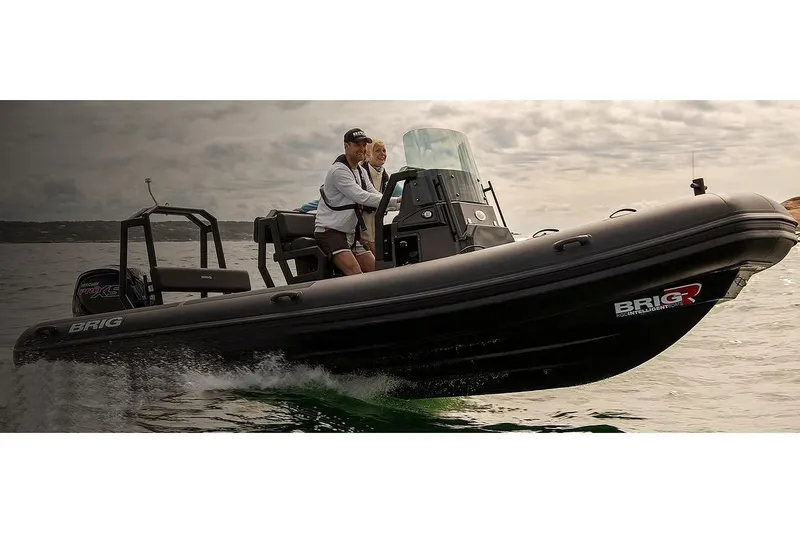 The Image of Manufacturer Provided Image: 2026 Brig Navigator 20 boat cruising on water with two people onboard. - 1