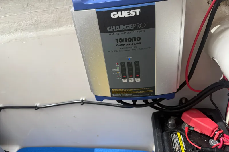 Slide: The Image of Marine battery charger in a 2015 Belzona 32 Center Console boat. - 23