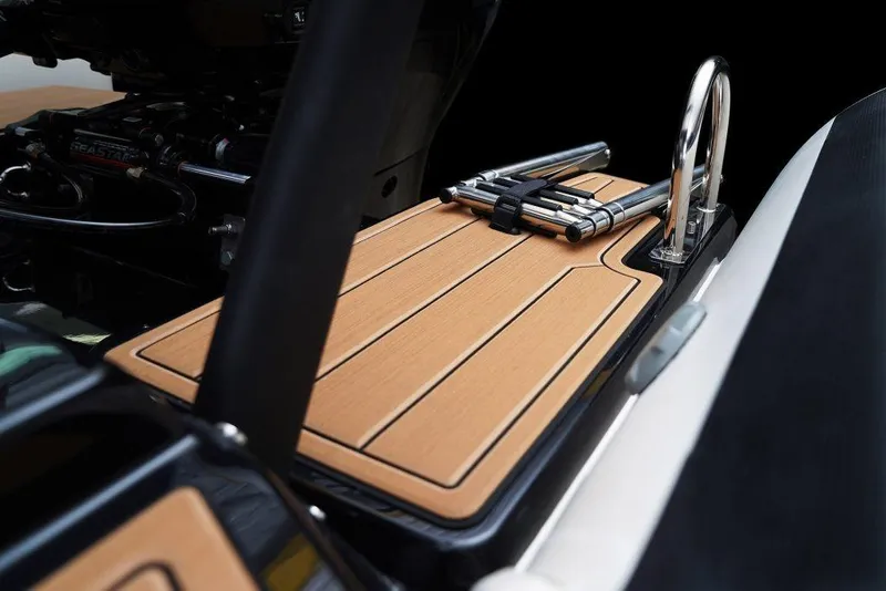 Slide: The Image of 2027 Brig Navigator 22 boat deck with wooden finish and metal fittings. - 5