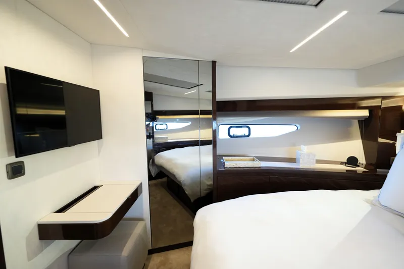Slide: The Image of Luxurious interior of 2023 Prestige 590 yacht with modern furnishings and sleek design. - 67