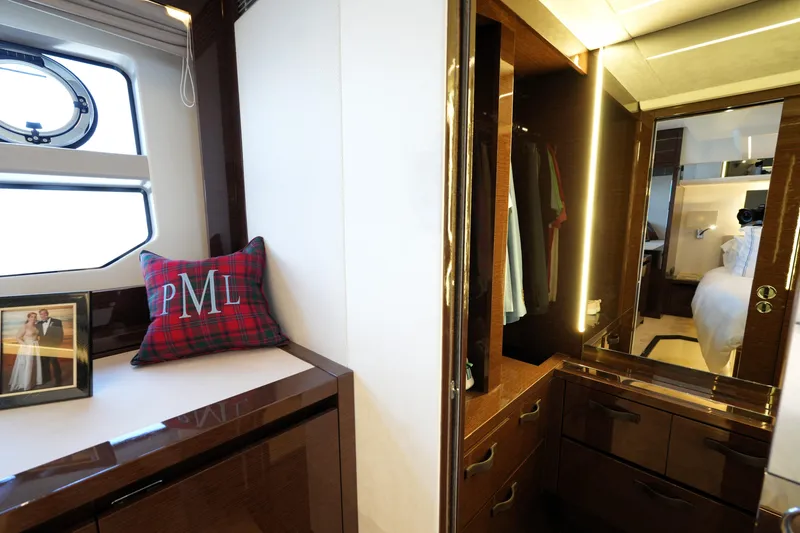 Slide: The Image of Luxurious interior of 2023 Prestige 590 yacht with elegant wood finishes and cozy decor. - 84
