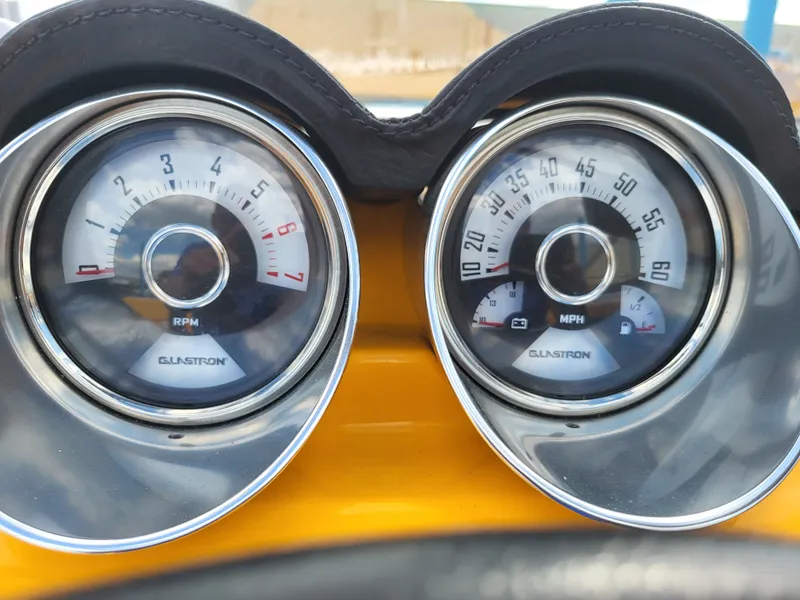 Slide: The Image of Close-up of Glastron GT 229 dashboard gauges, showing tachometer and speedometer. - 7