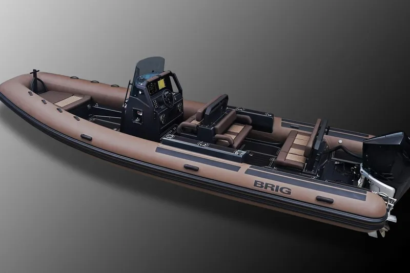 Slide: The Image of 2027 Brig Navigator 26 inflatable boat with sleek design and modern features. - 8
