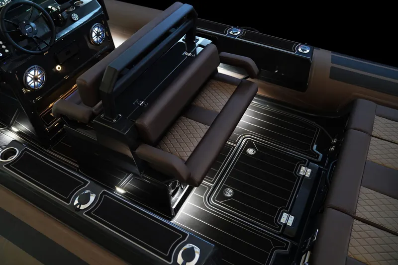 Slide: The Image of Luxurious interior of 2027 Brig Navigator 26 boat with sleek seating and modern dashboard. - 9
