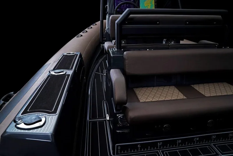 Slide: The Image of 2027 Brig Navigator 26 interior with sleek seating and modern design elements. - 7