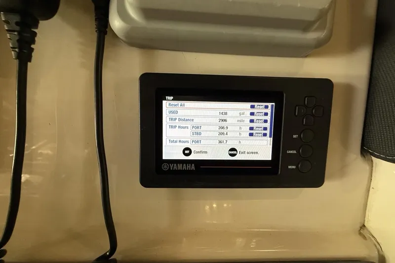 Slide: The Image of Yamaha display showing trip data on a 2021 Grady-White Freedom 275 boat. - 7