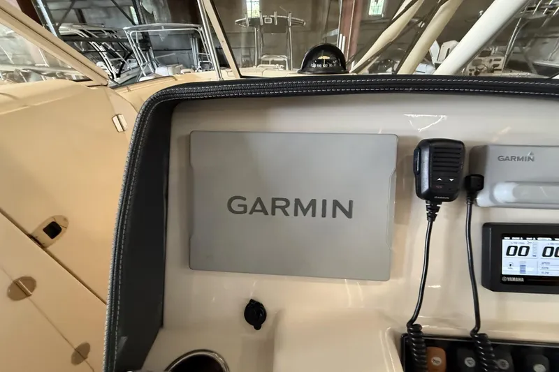 Slide: The Image of Dashboard of 2021 Grady-White Freedom 275 with Garmin navigation system. - 8
