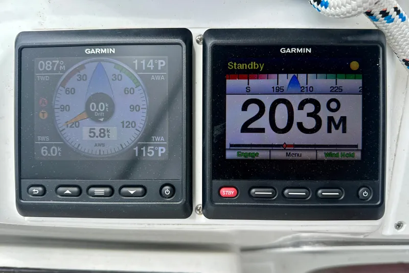 Slide: The Image of Garmin navigation displays on a 2002 Beneteau Oceanis Clipper 473 sailboat. - 19