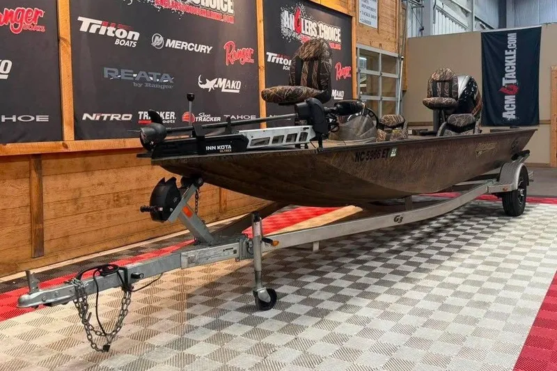 Slide: The Image of 2021 G3 Sportsman 1910 fishing boat on trailer in showroom setting. - 10
