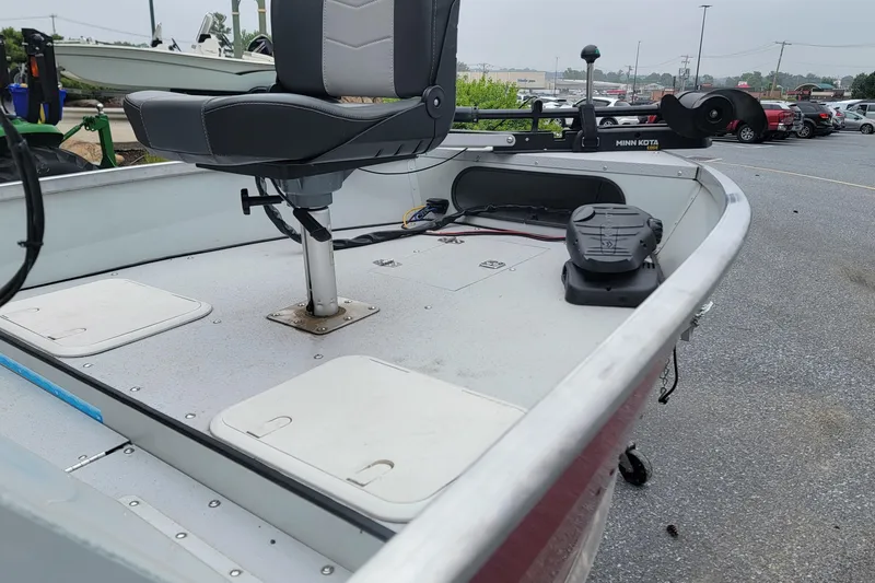 Slide: The Image of 2023 Duranautic V-16 boat with swivel seat and Minn Kota trolling motor in parking lot. - 4