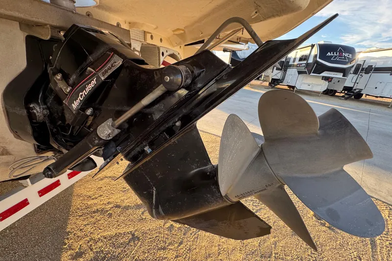 Slide: The Image of Close-up of a 2010 Bennington 2375RL boat's MerCruiser Bravo Three outdrive propeller. - 5
