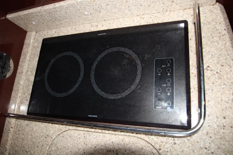 Slide: The Image of Built-in cooktop on 2008 Sea Ray 38 Sundancer yacht kitchen counter. - 38