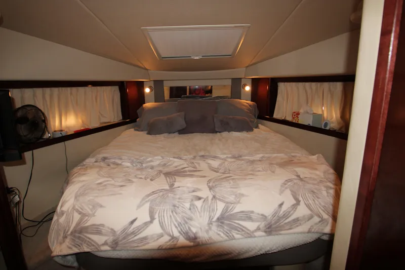 Slide: The Image of Cozy bedroom interior of 2008 Sea Ray 38 Sundancer yacht. - 39