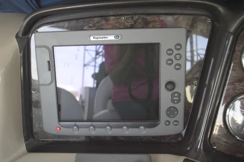 Slide: The Image of Raymarine GPS display on 2008 Sea Ray 38 Sundancer boat dashboard. - 26