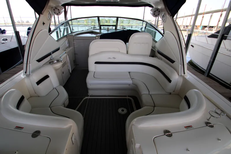 Slide: The Image of 2008 Sea Ray 38 Sundancer interior with spacious seating and modern design. - 9