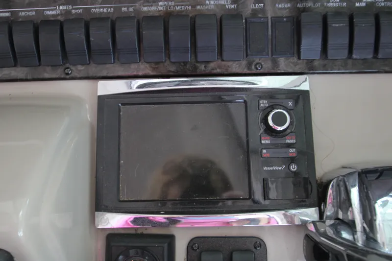 Slide: The Image of Control panel of 2008 Sea Ray 38 Sundancer boat with navigation system. - 24